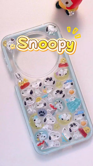 Handcrafted clear ice blue phone case filled with a dense 3D collage of glossy, holographic aurora bubble ghost bird charms reflecting colorful rainbow light.