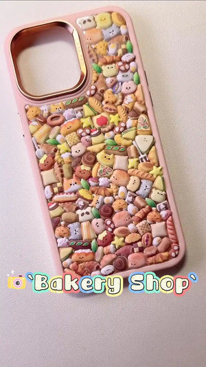 Handcrafted clear phone case with a sand pink border and luxury rose gold camera rim, densely filled with a 3D collage of glossy, golden-brown cartoon sandwiches, croissants, and bread loaves.