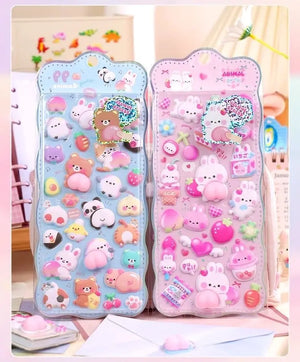 Collection display of 2 styles of 3D peach butt stickers (light blue & pink), cute animal party design