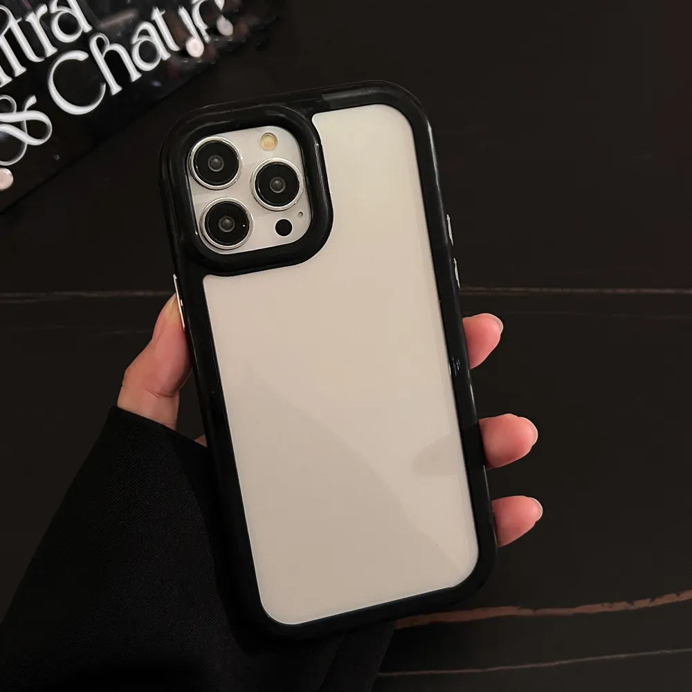 A minimalist hybrid protective phone case with a sharp black bumper frame and a crystal clear transparent back panel, held in hand.