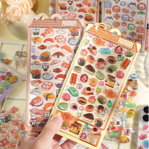BONBON DROP" cute kawaii sticker sheet with realistic Japanese snack and sushi designs, perfect for DIY phone case decoration.