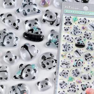 Close-up of BONBON DROP 3D crystal panda stickers, showing transparent embossed texture
