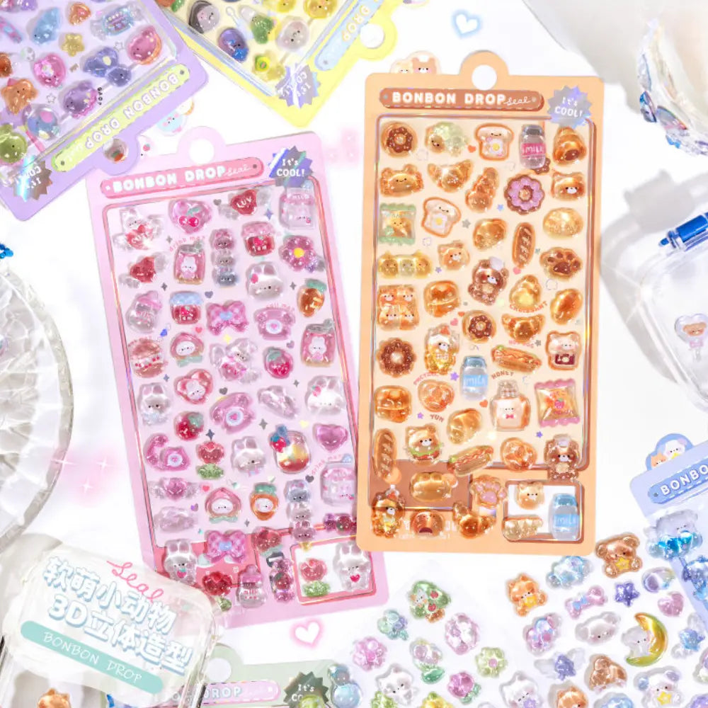 Scene display of bread and pet themed "BONBON DROP" 3D crystal puffy sticker sheets, featuring cute bear and bread designs in pink and orange pastel tones
