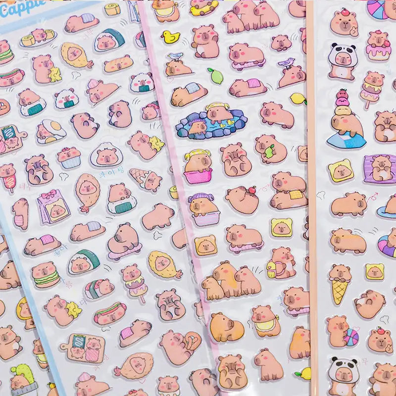 Close-up of 3D puffy Capybara stickers, showing detailed cute capybara designs with dessert and daily life elements, self-adhesive PVC stickers