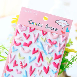 Close-up of "Colorful Sticker" 3D puffy heart stickers with varied shapes and pastel colors (pink, red, blue, yellow), perfect for romantic DIY decoration.
