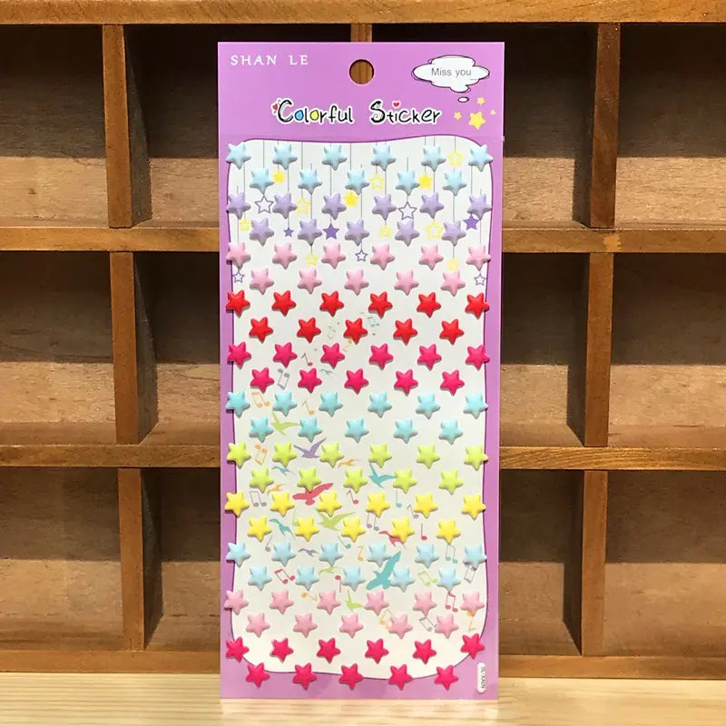 Display of "Colorful Sticker" 3D puffy colorful star stickers, featuring pastel stars with musical note accents, perfect for DIY decoration.