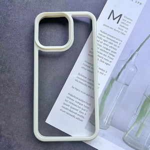 Clear DIY phone case for iPhone with cream-colored protective frame and transparent back panel, featuring raised camera protection, ready for sticker decoration.