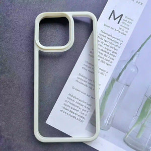 Clear DIY phone case for iPhone with cream-colored protective frame and transparent back panel, featuring raised camera protection, ready for sticker decoration.