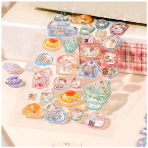 Decorative display of 3D dessert cat crystal stickers used for journal DIY, featuring cute cat and dessert designs, ideal for sweet-themed crafts