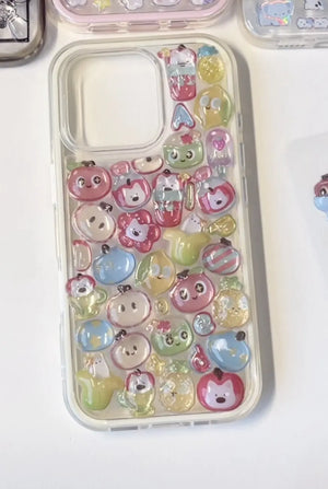 Finished DIY clear iPhone case decorated with colorful 3D fruity kawaii stickers, including cute fruit and animal characters.