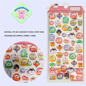Product display of Japanese daruma pet themed 3D crystal puffy sticker sheet, including material (PVC/epoxy resin) and packaging size (200mm×95mm), cute kawaii daruma and sushi stickers for planner and DIY craft decoration