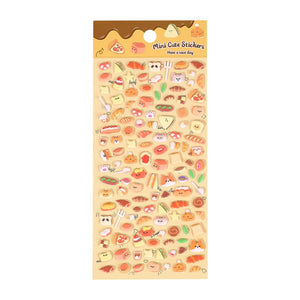 A sheet of "Mini Cute Stickers" featuring 3D resin bread, toast, croissants, and baker animals in warm tones.