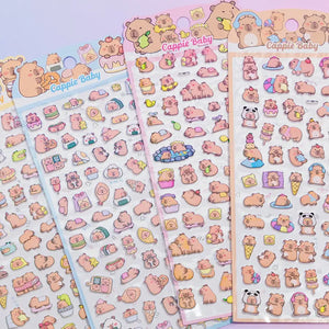 Multi-pack display of 3D puffy Capybara sticker sheets, featuring cute cartoon capybara characters in various poses, self-adhesive epoxy PVC stickers