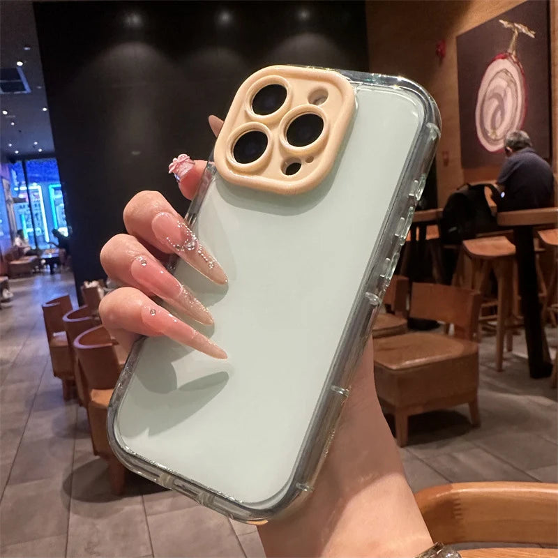 A premium hybrid protective phone case featuring a light mint blue shockproof border, a contrasting creamy yellow camera bezel, and a crystal clear back panel.
