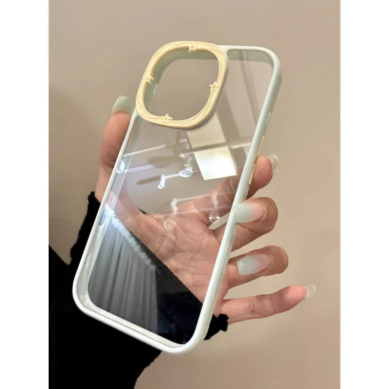 A premium hybrid protective phone case featuring a soft mint green bumper frame, a unique contrasting light yellow camera protection rim embossed with star details, and a crystal clear back panel.