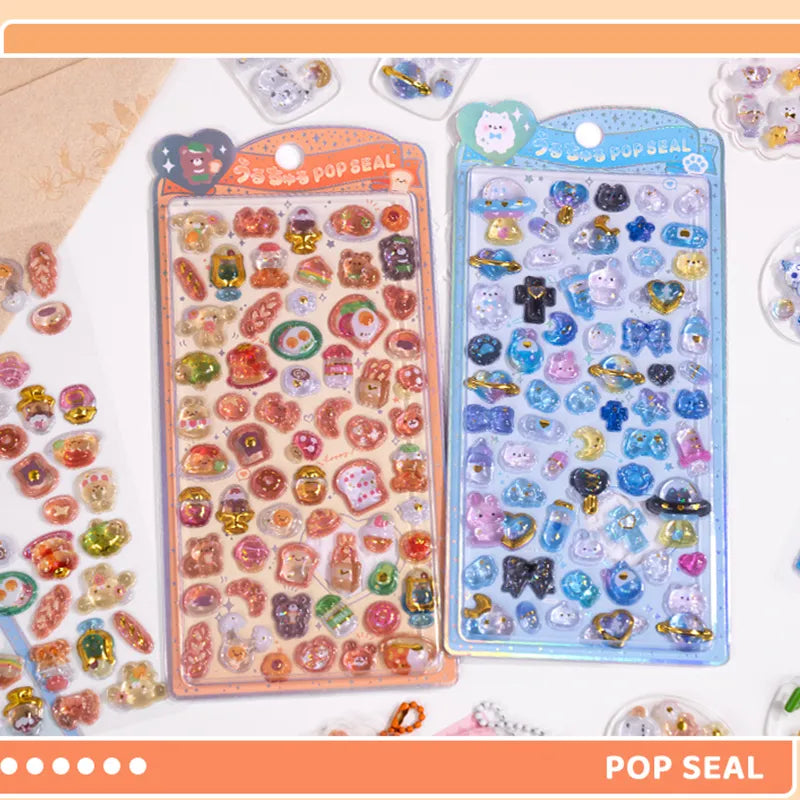 Collection of 3D crystal puffy sticker sheets with cute dessert, pet, and space designs, in orange and blue color schemes