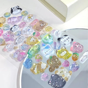 Close-up of 3D crystal clear pet stickers with adorable bear, panda, and cat designs, featuring iridescent and glitter effects, self-adhesive PVC epoxy stickers