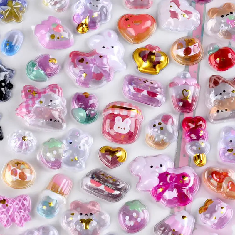 Close-up of 3D crystal clear stickers with adorable pink rabbit, dessert, and bow designs, featuring glitter and gold foil effects, self-adhesive PVC epoxy stickers