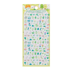 A sheet of pastel green and yellow Japanese kawaii 3D stickers featuring spring outing themes like trees, little cars, and cats for DIY crafting.