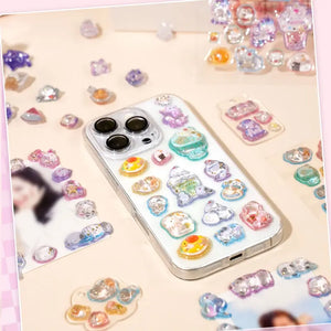 Decorative display of 3D unicorn and pet crystal stickers used for phone case DIY, featuring adorable designs with holographic and glitter effects