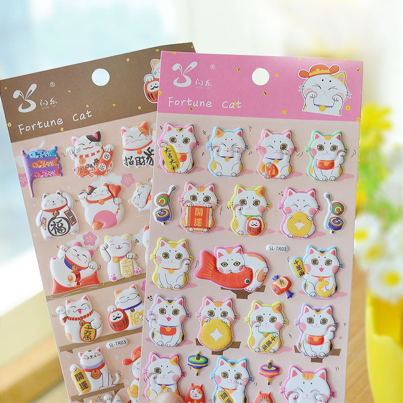 Adorable fortune cat cute paradise-themed 3D bubble gum stickers with lucky cat designs. Perfect for decorating phone cases, laptops & journals. Soft rubber kawaii stickers.