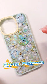 Handcrafted clear phone case with a mint green border and yellow star camera frame, densely filled with a 3D collage of glossy, glitter-infused Pochacco dog charms, golden hearts, and mini rocking horses.