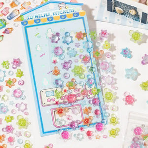 A sheet of 3D relief stickers featuring colorful, translucent jelly-textured sea turtles and stars for DIY crafting.