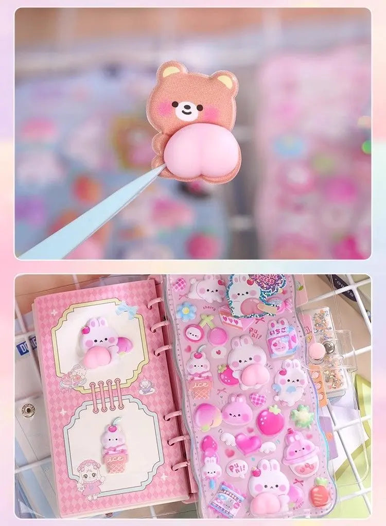 Close-up of 3D peach butt sticker detail (bear) and journal decoration effect, showing soft embossed texture