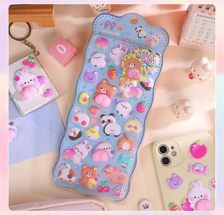 Scene display of light blue 3D peach butt sticker, applied on card holder and phone case with cute plush dolls