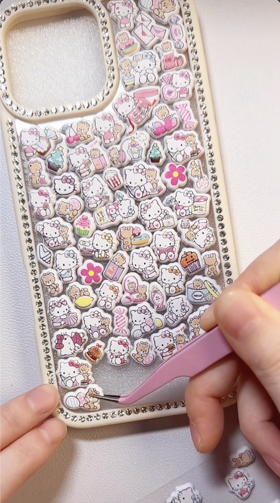 Adorable handmade Hello Kitty and bling frame collage clear iPhone case. Unique kawaii Sanrio design featuring 3D epoxy stickers. Premium custom phone case for Hello Kitty fans.