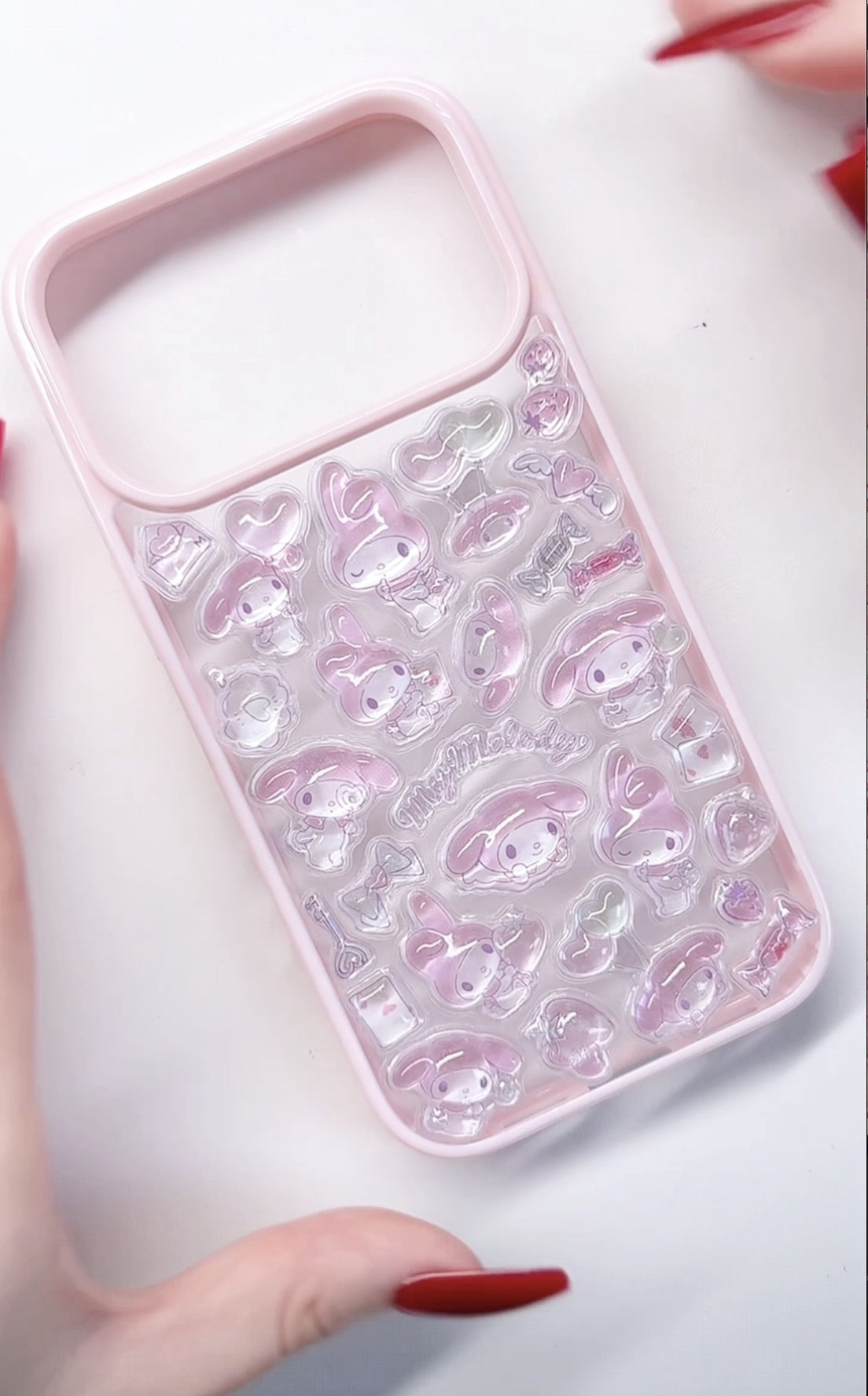 Adorable handmade My Melody pink clear iPhone case. Unique kawaii Sanrio design featuring 3D epoxy stickers. Premium quality custom phone case for My Melody fans.