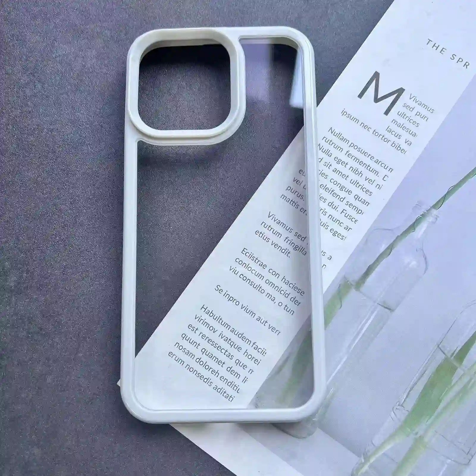 A clean, cream-white protective phone case frame used as a base for handmade DIY resin decorations.