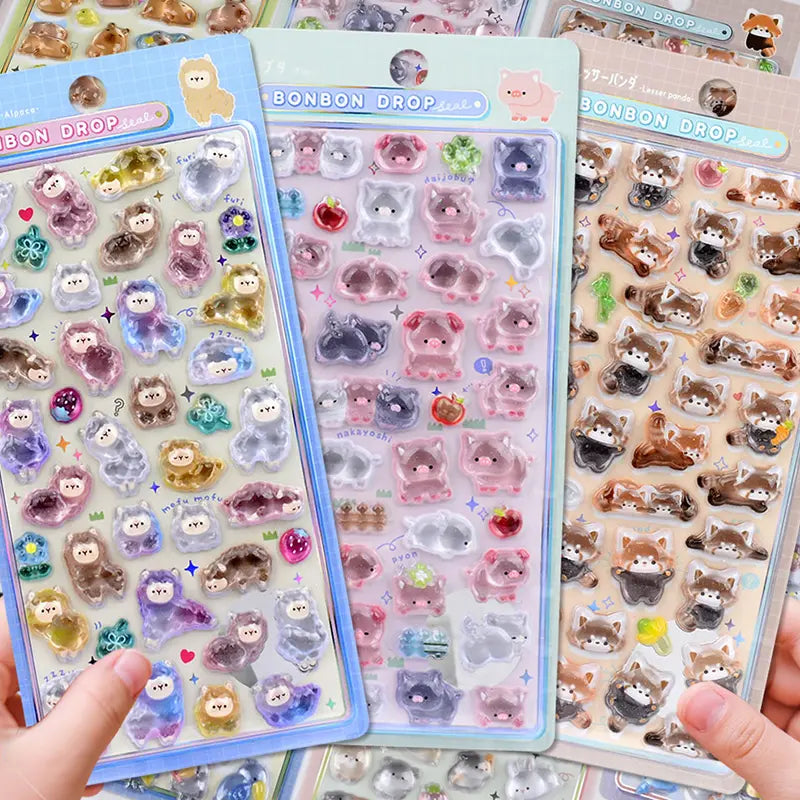 Collection display of multiple BONBON DROP 3D crystal sticker styles (alpaca, pig, red panda, etc.), cute animal designs