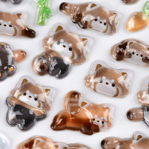 Close-up of BONBON DROP 3D crystal red panda stickers, showing transparent embossed texture with glitter