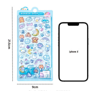 Size comparison of BONBON DROP 3D crystal sticker sheet (21.5×9cm) with iPhone X, showing actual size