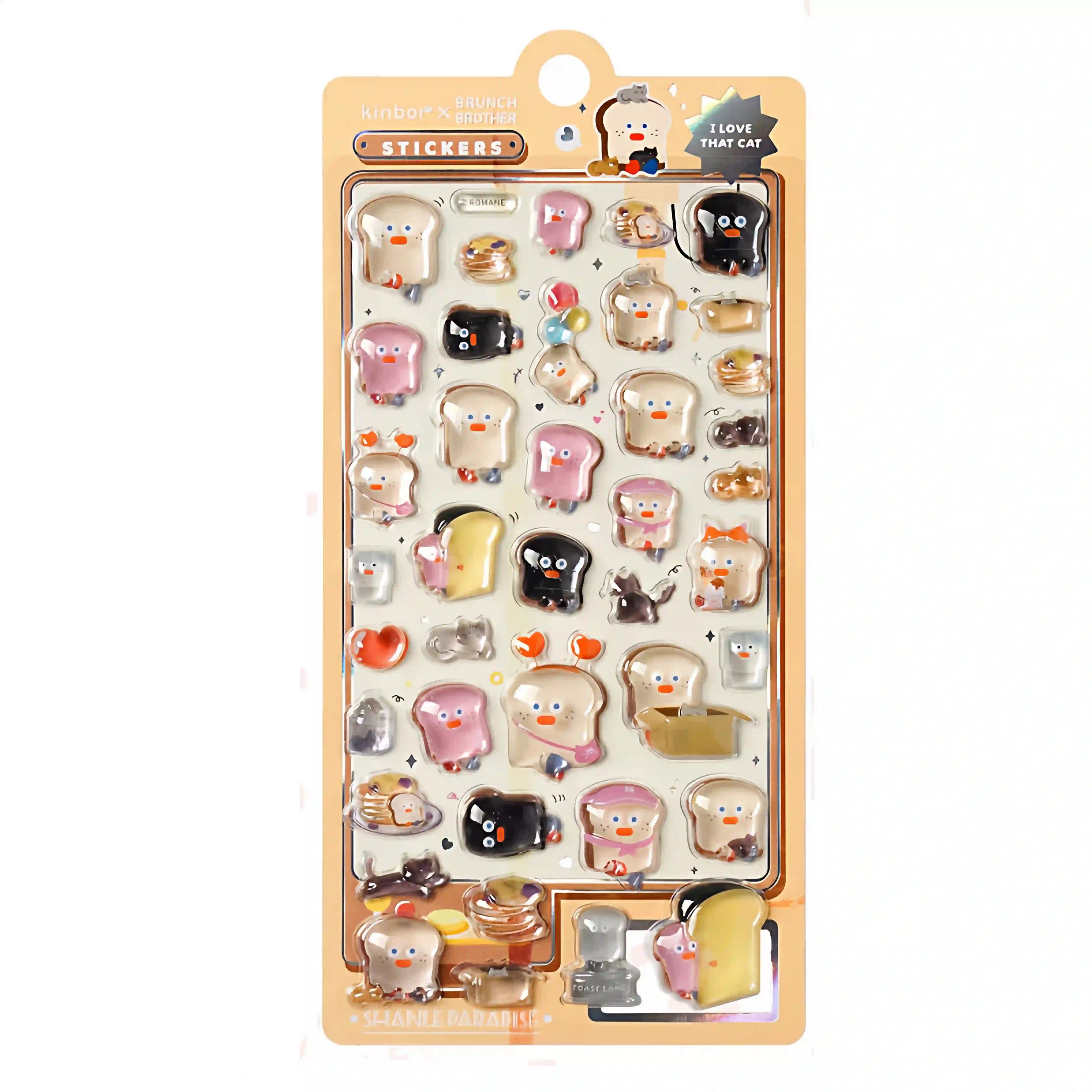 A retail sheet of 3D glossy puffy stickers featuring a cute Korean style brunch cafe theme with funny toast characters, pancakes, and black cats for DIY crafting.