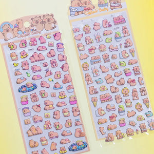 Multi-pack display of 3D puffy Capybara sticker sheets, showcasing cute cartoon capybara designs with desserts, ice cream, and relaxing scenes, self-adhesive epoxy PVC stickers
