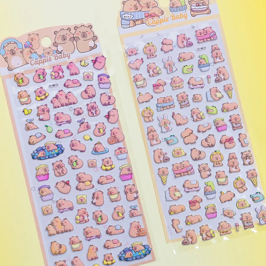 Multi-pack display of 3D puffy Capybara sticker sheets, showcasing cute cartoon capybara designs with desserts, ice cream, and relaxing scenes, self-adhesive epoxy PVC stickers
