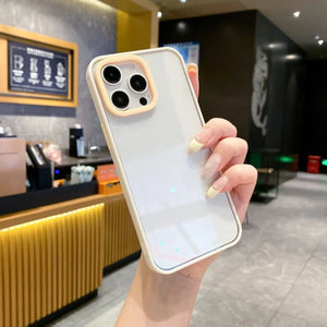 A premium hybrid protective phone case featuring a soft cream white bumper border, a contrasting pastel yellow camera protection frame, and a crystal clear back panel.