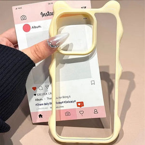 Clear DIY phone case for iPhone with cream yellow bear ear frame and transparent back panel, featuring raised camera protection, ideal for sticker decoration.