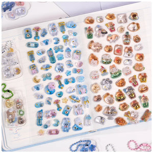 Decorative display of 3D crystal clear stickers with cute animal and snack designs, used for journal and keychain DIY
