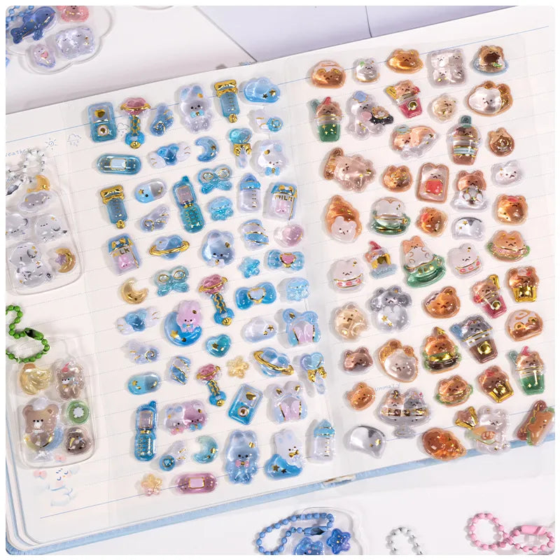 Decorative display of 3D crystal clear stickers with cute animal and snack designs, used for journal and keychain DIY
