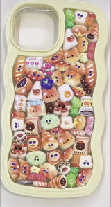 Finished DIY iPhone case with cream wavy frame, decorated with dense cute bread, pastry, and animal stickers, creating a cozy bakery aesthetic.