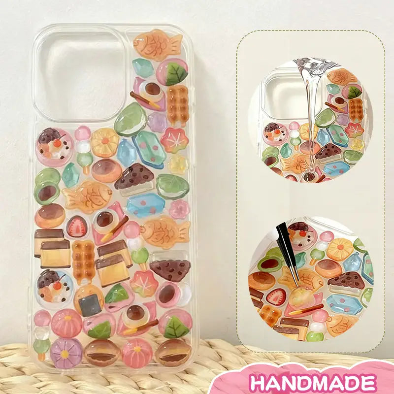 Finished DIY clear iPhone case, decorated with dense Japanese snack and sushi stickers, creating a warm and delicious bakery aesthetic.