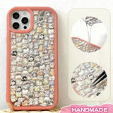 Finished DIY iPhone case with coral orange frame, decorated with dense mini multi-breed animal stickers, creating a warm and lively cute aesthetic.