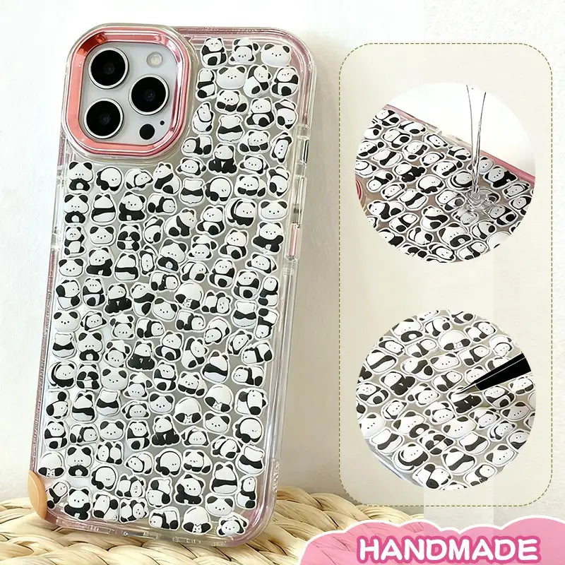 Finished DIY clear iPhone case with pink gradient frame, decorated with dense mini panda stickers, featuring a cute minimalist black and white panda aesthetic.