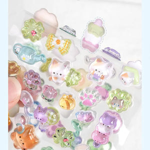 Handheld display of 3D crystal puffy garden cat sticker sheet, showcasing cute cat, flower, and watering can designs with iridescent effects
