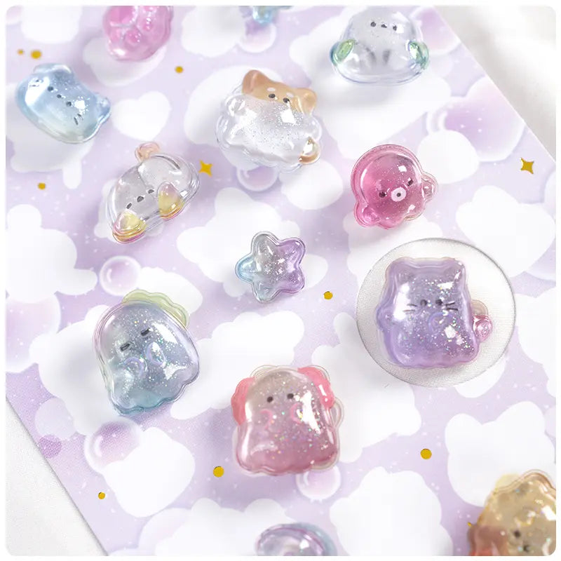 Close-up of 3D crystal clear pet stickers with adorable ghost and cat designs, featuring iridescent and glitter effects, self-adhesive PVC epoxy stickers