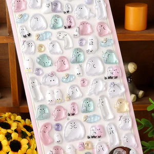 Close-up of 3D crystal clear ghost pet stickers with adorable ghost designs, featuring iridescent and glitter effects, self-adhesive PVC epoxy stickers