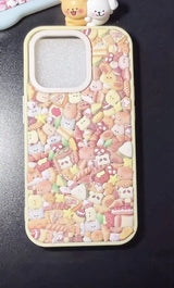 Final product of a handmade DIY phone case densely covered in 3D resin bread and bakery-themed charms.